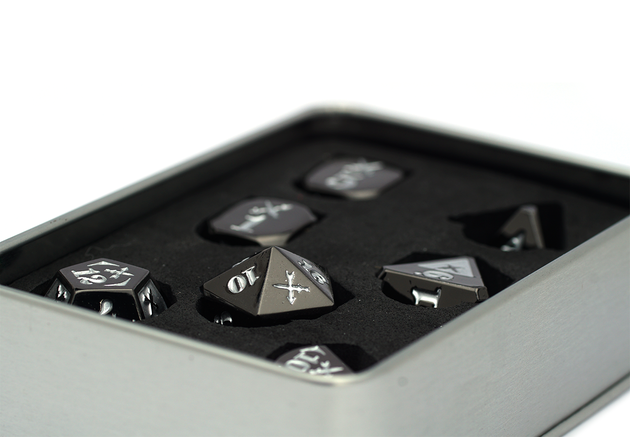 Gyld Metal Damage Dice - Piercing black metal dice polyset in a tin