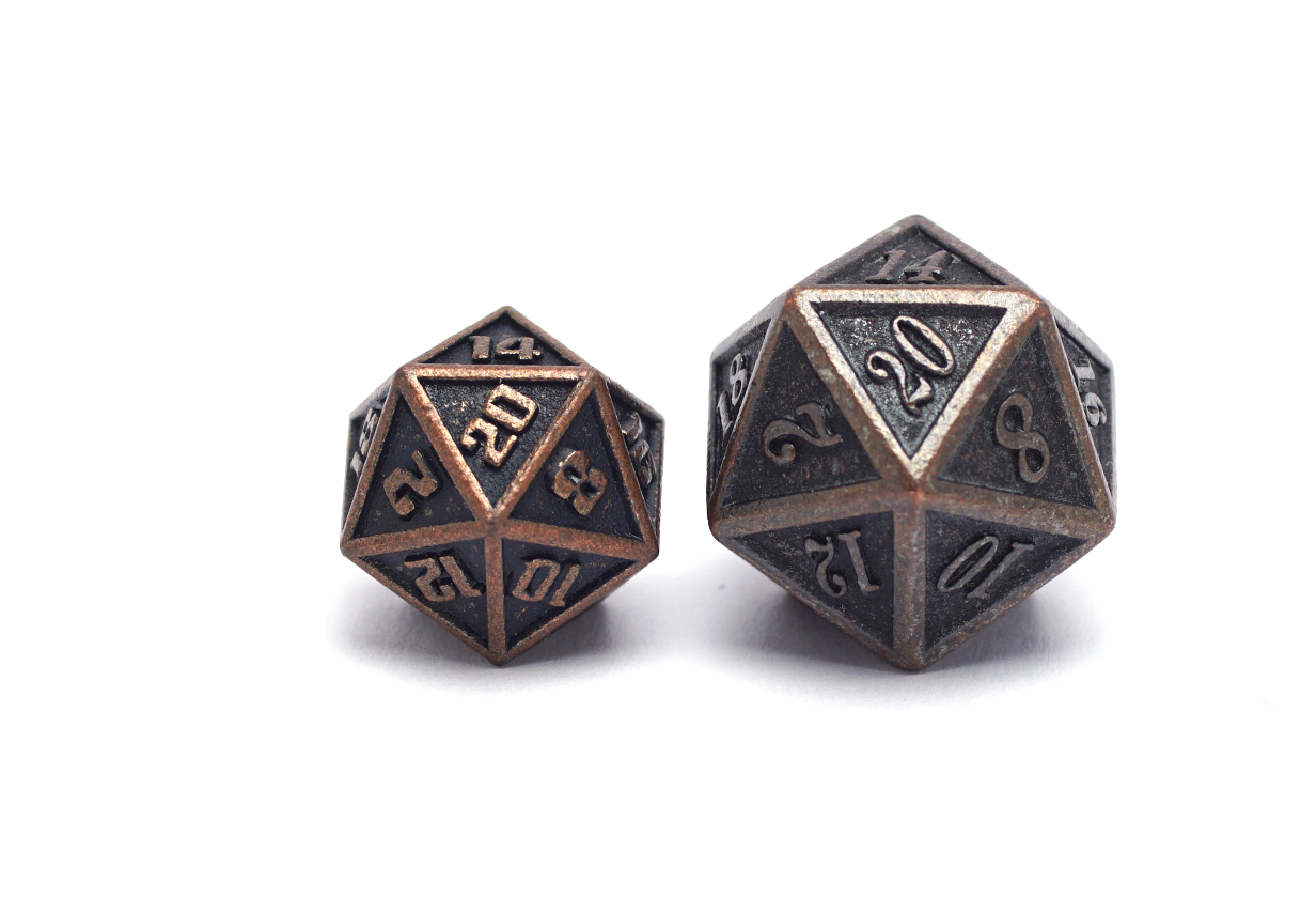Mini Metal Dice - Copper close up of d20 compared to a much larger d20