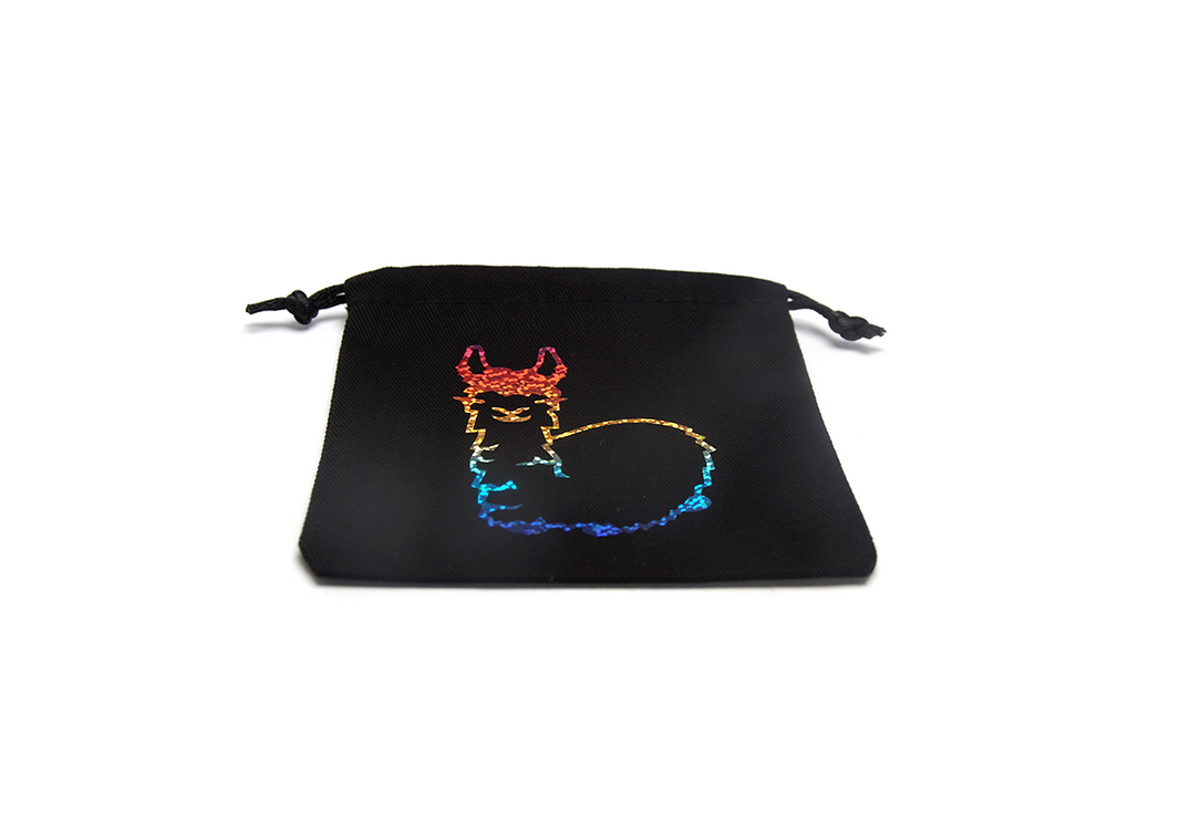 Shimmering Llama Dice Bag black sequins lying flat