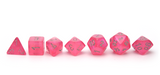 Chessex Borealis | Pink dice with silver ink that glow in the dark line up