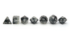 Snowstorm Dice - black and grey translucent cloudy dice with silver numbers lined up